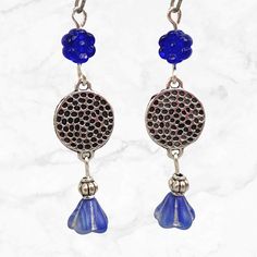 Cobalt blue earrings with silver accents. Deep blue beads contrast beautifully against silver. These long beaded earrings are lightweight and comfortable for daily wear.  Hypoallergenic ear wires (nickel and lead free). Select ear wire style at checkout. Artisan glass beads produced in small quantities in the Czech Republic. A gift for you or someone special, earrings are carded and in an organza bag. More of my silver earrings: https://www.etsy.com/shop/JezaJewelry?ref=simple-shop-header-name&l Blue Metal Beaded Drop Earrings, Blue Metal Beaded Dangle Earrings, Nickel-free Czech Glass Flower Dangle Earrings, Nickel-free Czech Glass Dangle Earrings, Blue Flower Earrings Nickel Free, Blue Metal Earrings With Dangling Beads, Blue Flower-shaped Sterling Silver Earrings, Blue Teardrop Nickel Free Flower Earrings, Blue Teardrop Nickel-free Flower Earrings