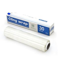 a roll of cling wrap on top of a white box next to it's packaging