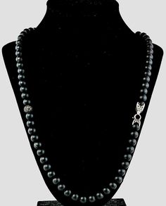 "A diamond \"Spiritual bead\" necklace from jewellery designer David Yurmam. Featuring a string of black Onyx beads and pave diamond bead on a sterling silver box link chain. A pave diamond set bead sits mid length and has approximately 0.90ct of black diamonds. Length 22.5 inches. Very good pre owned condition. Hallmarked on clasp with designers logo. Original Price £3800 Please ask should you have any further questions." Onyx Necklace With 8mm Round Beads, Formal Onyx Jewelry With Gemstone Beads, Formal Onyx Gemstone Beads Jewelry, Onyx Bead Necklace With 8mm Round Beads, Onyx Bead Necklaces With 8mm Round Beads, Luxury Black Jewelry With 8mm Beads, Luxury Onyx Round Bead Jewelry, Elegant Onyx Hand-strung Jewelry, Elegant Hand-strung Onyx Jewelry