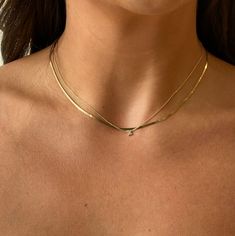 16" solid 14k yellow gold super dainty herringbone necklace. made with recycled metals in the usa.  due to its delicate nature, you may want to remove this piece while sleeping. Dainty Yellow Gold Herringbone Necklace For Everyday, Dainty Herringbone Necklace For Everyday, Dainty Yellow Gold Herringbone Necklace, Minimalist 14k Yellow Gold Herringbone Necklace, 14k Gold Yellow Gold Herringbone Necklace With Delicate Chain, 14k Yellow Gold Delicate Herringbone Necklace, Minimalist Yellow Gold Herringbone Necklace For Layering, 14k Gold Herringbone Necklace, Gold Herringbone Necklace