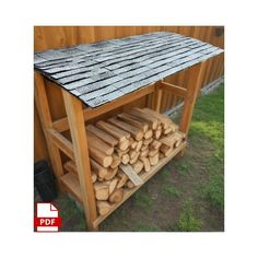 there are many logs stacked on top of each other in this outdoor firewood rack