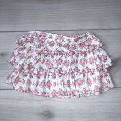 Janie & Jack Pink Floral Corduroy Ruffled Skirt. Pull on elastic waist. Size 3-6 months. Soft cotton corduroy. Excellent Used Condition Cute Cotton Mini Skirt With Ruffles, Cute Tiered Ruffle Skort, Cute Cotton Ruffled Skort, Cute Cotton Skort With Ruffles, Cute Ruffled Bottoms For Playtime, Cute Cotton Ruffle Skirt, Cute Cotton Tiered Skort, Cute Cotton Ruffled Skirt, Cute Cotton Skirt With Ruffles