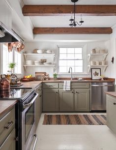 the kitchen is clean and ready for us to use in its new owner's home