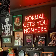 there is a neon sign that says normal gets you momhebe on the wall