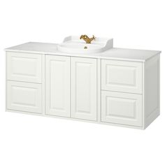 a white bathroom vanity with a gold faucet on the sink and cabinet doors