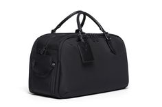 Functional Black Shoulder Bag With Gunmetal Hardware, Modern Black Luggage For Business Trips, Functional Black Travel Bag With Top Carry Handle, Modern Large Capacity Black Luggage, Functional Black Luggage For Business, Modern Black Travel Bag For Business, Versatile Black Bag For Business Trips, Versatile Black Shoulder Bag For Business Trips, Modern Black Bag For Everyday Carry