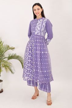 Embrace the essence of timeless elegance this summer with our exquisite handwoven Bengal Jaamdani cotton silhouettes. Crafted from lightweight fabric, these pieces offer both comfort and style, making them perfect for warm weather adventures. Size S: Bust - 38in, Waist - Free , Shoulder - 14in, Hip-Free, Sleeve-19" Size M: Bust - 40in, Waist - Free, Shoulder - 14.5in,Hip-Free, Sleeve-19" Size L: Bust - 42in, Waist - Free, Shoulder - 15in, Hip-Free, Sleeve-19" Size XL: Bust - 44in, Waist - Free, Shoulder - 15.5in, Hip-Free, Sleeve-19" Pants: Free Size : Relax-Stretch Waist: 24in-46in, Length:36 in These are garment measurements. Wash Care: Dry Clean Block Print Salwar Kameez In Mulmul, Cotton Block Print Semi-stitched Dresses, Semi-stitched Cotton Dresses With Block Print, Semi-stitched Cotton Block Print Dresses, Summer Cotton Palazzo Set With Cutdana, Summer Cotton Anarkali Set With Cutdana, Cotton Lawn Suit With Cutdana In Straight Kurta Style, Handloom Mulmul Straight Kurta Set, Summer Cotton Salwar Kameez With Cutdana