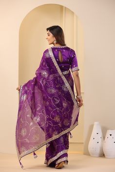 Go for this beautiful purple embroidered organza saree at parties and festive occasions. The saree comes with an embroidered blouse. Shop designer saree online in USA from Pure Elegance. Disclaimer: The actual product may vary slightly from the image. These are custom orders, hence expect slight variation in color, placement of the motif or buta. ESTIMATED DELIVERYBecause this is a custom order, it would take about 4 weeks from the date of purchase. RETURN POLICYThis product is a custom order an Purple Pre-draped Saree With Zari Work For Celebration, Purple Bollywood Blouse Piece In Dola Silk, Unstitched Purple Blouse Piece For Eid, Purple Blouse Piece With Resham Embroidery For Navratri, Purple Saree Blouse Piece With Resham Embroidery, Semi-stitched Purple Blouse Piece For Eid, Purple Semi-stitched Traditional Wear For Navratri, Semi-stitched Purple Traditional Wear For Navratri, Traditional Purple Pre-draped Saree For Party