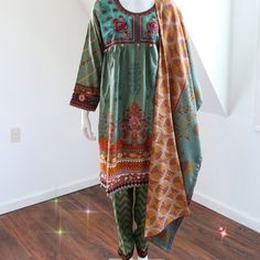 Beautiful Embroidered Frock With Printed Trouser And Dupatta. Size M Bust 40", Waist 37", Shirt Length 38". Multicolor Embroidered Dresses With Printed Motifs For Eid, Eid Dresses With Multicolor Embroidery And Printed Motifs, Green Embroidered Dress With Resham For Spring, Summer Cambric Dresses With Printed Motifs, Bohemian Cotton Dress With Dabka, Summer Cotton Dresses With Dabka Detailing, Bohemian Cotton Dress With Dabka Embroidery, Spring Lawn Suit With Multicolor Embroidery And Printed Motifs, Spring Cambric Dress With Printed Motifs