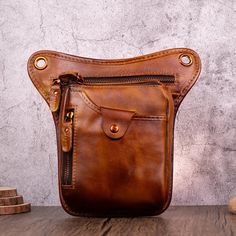 Custom Crossbody Bag Business Sling Bag Stylish Retro Casual Satchel Bag Small Durable Casual Hanging Bag Ladies Shoulder Carrying Bag  PRODUCT INFORMATION ☆MATERIALS: Made OF 100% First Layer Cowhide Leather ▶Size: 15 x 3.5 x 22 cm / 5.9 x 1.38 x 8.67 in ▶Weight: 350g ▶Capability: Cell phone, wallet, keys, etc. ▶Waist Strap: 67-103cm  Leg Strap:45-75cm ☞All dimensions are measured manually with deviation at 1-2cm. Thank you for your understanding. ❤This leg bag is specially designed by me for those who love to ride, choosing the right leg bag will not only enhance your riding experience, but also let you show your personality and style. It is compact and functional, allowing you to ride both handsomely and easily. Scientific allocation of space ensures that items are stored in an orderly Brown Pouch With Pockets For Everyday Carry, Brown Anti-theft Pouch Bag, Outdoor Brown Pouch With Pockets, Brown Outdoor Pouch With Pockets, Brown Chest Bag With Pockets For Everyday Carry, Brown Chest Bag With Pockets For Outdoor Activities, Casual Satchel, Travel Motorcycle, Male Chest