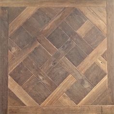 an image of wood flooring that looks like herringbones