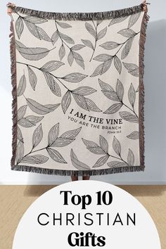 the top 10 christian gifts to give this christmas season - featured is an image of a wall hanging with text that reads, i am the vine