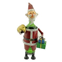 a christmas ornament with a santa clause holding a gift bag and a bell