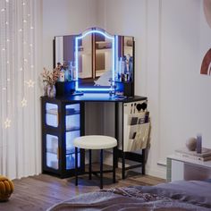 a bedroom with a vanity and stool in it