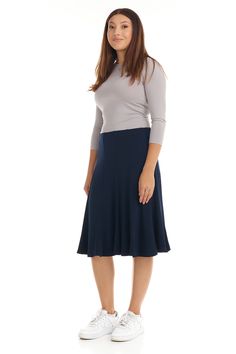 The Navy Blue Florence A-line skirt is a simple yet stylish, and flattering, below knee length panel skirt. It is made of a soft, stretchy fabric that is lightweight, comfortable and has fabulous flare. A nice fabric to dress up for the holidays, or dress down for work. Modest / Tznius A-line flary modest skirt Pull-on closure No pockets No slits Below knee-length Skirt length: Sizes XS-S: 24" M-L: 25" XL: 25.5" 1X-3X: 26" Machine wash cold inside out, hang/line to dry Slim models range from 5'5