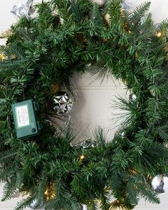 a christmas wreath with lights on it