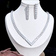 A beautiful three-piece bridal jewelry set that will add elegance and sophistication to any wedding gown or formal ensemble! Adorned with intricately faceted cubic zirconia that capture the light from every angle with a perfectly translucent appeal, the pieces are platinum / 14K yellow gold plated for a flawless finish which enhances the intricate detailing and conveys a modern take on old elegance. Necklace: 17.7" (approx. 45cm) long with a secure fold-over closure (a 2" extension chain can be Find Your Own Style, Bridal Jewelry Set, Floral Heels, Elegant Sets, Bridal Belt, Bridal Bracelet, Wedding Jewelry Sets, Bridal Jewelry Sets, Bridal Hair Accessories