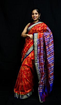 Weaver communities of Maniabandha and Nuapatana of Odisha traditionally weave this kind of saree. Common motifs are star, temple, conch, rudraksh, fish, chakra, lotus etc. The inspiration of all its designs comes from nature. It is the best of single ikat; one of warp and weft is tied and dyed prior to weaving. The borders and the pallas have tremendous variety and each one of them is attractive and praiseworthy. Specification:  Occasion: Festive Wear Fabric: Mulberry Silk,  Primary Color: Red S Multicolor Ikat Print Pre-draped Saree For Navratri, Navratri Ikat Print Pre-draped Saree, Traditional Art Silk Pre-draped Saree For Rituals, Festival Pre-draped Chanderi Saree With Woven Motifs, Traditional Ikat Print Pre-draped Saree For Festivals, Traditional Multicolor Pre-draped Saree For Navratri, Saree For Rituals And Festivals With Traditional Drape, Traditional Ikat Print Paithani Silk Wear, Traditional Wear Katan Silk With Ikat Print