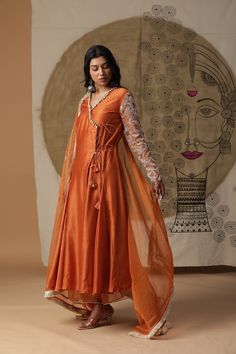 orange fusion wear in Chanderi silk. Perfect for semi and formal occasions. its light wear, comfortable fabric and fit. Bollywood Style Orange Palazzo Set With Pallu, Festive Orange Palazzo Set With Sheer Dupatta, Orange Sharara With Straight Kurta And Pallu, Orange Cutdana Palazzo Set For Festivals, Festive Orange Cutdana Palazzo Set, Traditional Drape Orange Palazzo Set With Dupatta, Orange Palazzo Set With Dupatta And Traditional Drape, Orange Designer Palazzo Set For Navratri, Orange Palazzo Set With Sheer Dupatta For Diwali