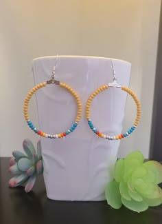 Handmade Colorful Czec glass seed bead earrings Southwestern Style Hoop Earrings Hoop size is 1 1/2 inches in diameter  Silver plated earwire Lightweight earring, perfect for casual wear.  I can imagine these earrings worn with a tank top and jeans to add a splash of color to your outfit! Cheap Summer Beaded Hoop Earrings, Hoop Earring Ideas, Colorful Beaded Hoop Earrings For Everyday Summer, Everyday Multicolor Small Hoop Beaded Earrings, Orange Beaded Hoop Earrings, Southwestern Beaded Hoop Earrings, Top And Jeans, Jewerly Beads, Diy Jewlery