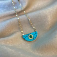 Turquoise Pendant Necklace With Clavicle Chain, Elegant Turquoise Charm Necklaces With Adjustable Chain, Elegant Turquoise Charm Necklace With Adjustable Chain, Turquoise Round Gold-plated Jewelry, Turquoise Gold-plated Round Jewelry, Turquoise Pendant Jewelry With Delicate Chain, Turquoise Pendant With Delicate Chain, Turquoise Clavicle Chain Necklace For Jewelry Making, Turquoise Evil Eye Amulet Necklace