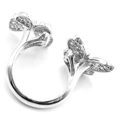 Van Cleef & Arpels 18k White Gold Diamond Two Butterfly Between Finger Ring  Metal: 18k White Gold  Size: European 52, US 6  Weight: 9.2 grams  Width; 20mm  Stones: 70 round brilliant cut diamond VVS1 clarity, E color total weight 1.67ct  Hallmarks: Cartier 750 52 JA19XXX (Serial Omitted) T3352ooled  Dimensions reference the ring size and are not specific to the ring itself. Elegant Butterfly Ring With Brilliant Cut For Formal Occasions, Elegant Round Butterfly Ring For Formal Occasions, Elegant Butterfly Ring With Prong Setting For Formal Events, Formal Butterfly Ring With Brilliant Cut, Luxury Butterfly Ring For Anniversary, Luxury White Gold Butterfly Ring For Wedding, Formal White Gold Butterfly Ring With Diamond Accents, White Gold Butterfly Ring For Formal Events, Elegant White Gold Butterfly Ring For Anniversary