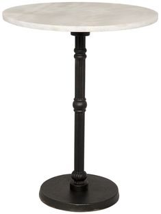 a white marble top table with black metal pedestals and an iron base, on a white background