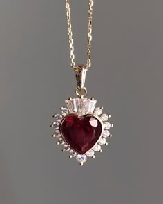 ------------------------------------------------------------------------------ ❤ Product Information ❤ ------------------------------------------------------------------------------ Vintage Herat Shape Ruby Gemstone Pendant,Heart Cut Ruby Gemstone Wedding Gift Pendant,Anniversary Gift For  ✥ 𝐌𝐚𝐢𝐧 𝐒𝐭𝐨𝐧𝐞 𝐃𝐞𝐭𝐚𝐢𝐥𝐬 ↣ Shape:  Heart Cut ↣ Type: Moissanite  ↣ Weight: 2.00 Carat (App.) ↣ Color: Colorless ↣ Clarity: VVS1 ↣ Making Process: Handmade - Crafted by our experienced team ✥ 𝐒𝐢𝐝𝐞 𝐒𝐭𝐨𝐧𝐞 𝐃𝐞𝐭𝐚𝐢𝐥𝐬 ↣ Shape: Round & Baguette Cut ↣ Type: Moissanite ↣ Weight: 0.50 Carat (App.) ↣ Color/: Colorless/ VVS-VS ↣ Options: Lab Grown Diamond and Natural Diamond (Possible on request while placing an order and Extra Chargeable Service) ✥ 𝐑𝐢𝐧𝐠 𝐃𝐞𝐭𝐚𝐢𝐥𝐬 ↣ Band Width: 1.8 Ruby Gemstone Aesthetic, Aesthetic Assecories, Anniversary Jewelry For Her, Heart Jewlery, Ruby Aesthetic, Ruby Heart Necklace, Ruby Heart Pendant, Roses Jewelry, Ruby Diamond Necklace