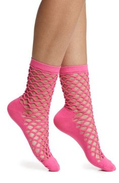 Fishnets meet crew socks in this edgy cotton-blend pair fashioned with a ribbed cuff to prevent slipping and an opaque footbed for comfort in every step. Cotton/polyester/spandex Machine wash, tumble dry Imported Trendy Stretch Hosiery For Spring, Casual Mid-calf Hosiery For Spring, Casual Mid-calf Spring Hosiery, Trendy Knee-high Spring Socks, Casual Knee-high Summer Hosiery, Casual Knee-high Hosiery For Summer, Stretch Mesh Fishnet Socks, Stretch Fishnet Socks Made Of Mesh, Stretch Fishnet Mesh Socks