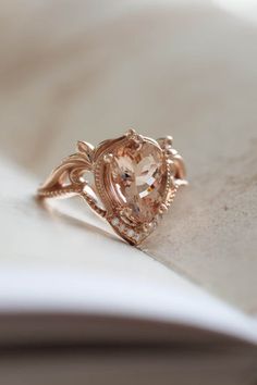 Morganite engagement ring in rose gold, statement ring with peach morganiteShop this style with different options: LidaThis listing is for the set of two rings:Lida engagement ring with 10x7 mm morganite and moissanites / diamondsChevron styl... Eden Garden, Peach Morganite, Gold Statement Ring, Morganite Engagement, Morganite Engagement Ring, Matching Band, Unique Engagement, Jewelry Business, Sparkle Diamonds