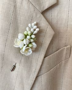 This wedding blossom lapel pin is fully handmade. Each element (flower, petal or leaf) is made entirely by hands from material called cold porcelain and toned with soft pastel. These flowers look much like fresh flowers but they will never fade.  This wedding boutonniere is absolutely unique and perfect for weddings and other celebrations. But also it will be good even as casual accessory. Flowers are tender and delicate.  length - 3 inches (7,5 cm) Care: You should treat with care this product. If it is dirty, do not worry. Just wipe with a slightly damp cloth. Delivery: All products are securely packed in special containers to avoid any damage during delivery. You will get your flower accessory in nice gift box. I will gladly make something special for you. Feel free to ask me for person Winter Flower Pins For Suits, Cheap Elegant Flower Shaped Lapel Pin, Elegant White Wedding Brooches, Classic White Brooches For Formal Occasion, Classic White Brooch For Formal Occasions, Elegant White Handmade Flower Lapel Pin, Elegant White Lapel Pin With Handmade Flowers, Elegant White Pins For Formal Occasions, Elegant White Formal Pins