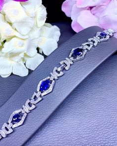 "A DREAM COMES TRUE! Gorgeous masterpiece! ONE OF A KIND Bracelet! Featuring 4 pieces of extra fine, SPARKLING CEYLON BLUE SAPPHIRES weighting a total of 9.93 carats... and 263 pieces of BIG SPARKLING, top-grade, F/VS, round and baguette Diamonds (3.32 carat in total). SET IN ONE-OF-A-KIND 18K Solid White Gold, meticulously designed and handcrafted BRACELET! A true heirloom piece that can transcend beyond times and eras.... BRAND NEW, HANDMADE BY OUR GOLDSMITHS! DAZZLING GENUINE CEYLON BLUE SAPP Fancy Sapphire Bracelet, Elegant Oval Link Tennis Bracelet Gift, Elegant Oval Link Tennis Bracelet As Gift, Luxury Sapphire Tennis Bracelet For Formal Occasions, Luxury Hand Set Oval Bracelets, Classic Blue Tennis Bracelet For Wedding, Exquisite Oval Diamond Bracelet For Formal Occasions, Timeless Oval Tennis Bracelet Gift, Timeless Oval Tennis Bracelet As Gift