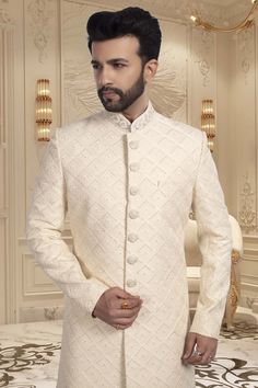 Looking for an elegant yet unique look on your wedding day? Look no further than our Mens Sherwani R14-S54! This thread-embroidered sherwani will make you stand out as the groom while showcasing a touch of quirkiness and style. Off White Nehru Jacket With Resham Embroidery, Off White Naqshi Bandhgala, Designer White Nehru Jacket With Cutdana, Designer Off-white Bandhgala For Eid, Designer Off-white Bandhgala With Resham Embroidery, Off White Sherwani With Chikankari Embroidery For Reception, Off White Sherwani With Chikankari Embroidery For Formal Occasions, Off White Formal Sherwani With Resham Embroidery, Formal Off White Traditional Wear With Chikankari Embroidery