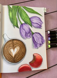 an open book with drawings of flowers and coffee in the shape of a heart on it