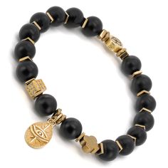 The Black Onyx Stone Gold Evil Eye Beaded Bracelet is a stunning piece of handmade jewelry that incorporates a variety of beautiful and meaningful elements. These elements create a unique piece of jewelry that is perfect for anyone who wants to add a touch of elegance, protection, and spiritual energy to their daily life. The Onyx Unique Eye Bracelet is a perfect accessory to wear on its own or to layer with other bracelets for a personalized and stylish look. The spiritual eye is a symbol of pr Black Symbolic Bracelet Jewelry, Bohemian Black Jewelry With Spacer Beads, Symbolic Black Bracelet Jewelry, Luxury Beaded Onyx Jewelry, Luxury Onyx Beaded Jewelry, Black Symbolic Jewelry With 8mm Beads, Spiritual Onyx Bracelets With Round Beads, Elegant Onyx Beaded Bracelets With Gemstone Beads, Spiritual Onyx Bracelet With Round Beads