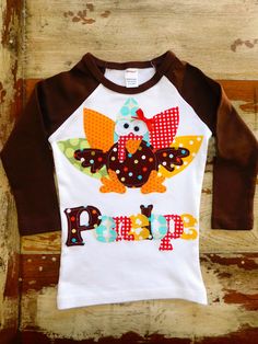 Silly Turkey Personalized Appliquéd Shirt! This set combines several different colors and designs. The top is a 100% cotton top with a heat sealed and sewn on applique. Size Chart Below: Baby Rib L/S Sleeve Raglan Tee This is a fitted shirt, I recommend rounding up...My daughter is 6 in a size 8 Size (in)Chest (in) Waist (in) Length (in) Sleeve Length (in) 6-12 m8.5 8 14 12 12-18m9.5 9 15 13 2 y 10.5 10 16 14 4 y 11.5 11 18 15 6 y 12.5 12 19 17 8 y 13.5 13 20 18 10 y 14.5 14 21 19 12 y 15.5 15 2 Barney Birthday, Pumpkin Dress, Y 15, Turkey Shirts, Fitted Shirt, Thanksgiving Shirt, Thanksgiving Shirts, Raglan Tee, Dinosaur Birthday