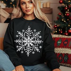 Snowflake Winter Christmas Sweatshirt,Vintage Snowflake Sweatshirt, Christmas Snowflake Sweater, Women Christmas Sweater, Winter Sweatshirt --------------------------------------------- |    Please Check All Photos for Details    | --------------------------------------------- - Due to monitor differences, actual colors may vary slightly from what appears online ---------------------- |    DESIGN COLOR    | ---------------------- - Black text/design will be printed on Light color shirts - White text/design will be printed on Dark color shirts ---------------------- |    HOW TO ORDER    | ---------------------- - Select the Shirt Size & Color - Select the quantity - Click Add to Cart - For multiple items go back to the listing and repeat the steps --------------------------- |    CARE INSTR Snowflake Sweatshirt, Sweatshirt Diy, Sweaters Winter, Snowflake Sweater, Christmas Gifting, Diy Sweatshirt, Winter Sweatshirt, Sweatshirt Christmas, Women Christmas