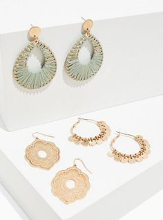 A set of beautifully detailed dangle earrings are the perfect way to accessorize your next outfit. This trio features a filigree curved kite pair, a straw wrapped teardrop pair and a beaded charm pair. Set of 3. Lever & french hooks. Base metal. Imported. The best plus size women's gold-tone & mint green dangle earrings set - of 3 sets in mint. Torrid is your destination for the freshest spring and summer styles.