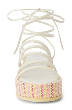 A woven platform amplifies the sunny-day appeal of an espadrille-inspired sandal secured by tubular straps and wraparound ankle ties. 1 1/2" platform Wraparound ankle strap with tie closure Synthetic upper, lining and sole Imported Ankle Tie Espadrilles, Black Wedge Sandals, Platform Wedge Sandals, On Beach, Sandal Women, Ivory Color, Platform Wedges, Slide Sandals, Platform Sandals