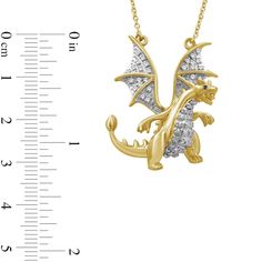 Slay with epic style when you wear this fantastical blue and white diamond dragon necklace in gold-plated silver. Created in sterling silver with 14K gold plate White diamonds shimmer along the outstretched wings and the belly. An alluring blue diamond dots the eye. This 1/6 ct. t.w. diamond dragon suspends centered along a cable chain that secures with a spring-ring clasp. 18.0-inch total length. Diamond Dragon, Diamond Dots, Dragon Necklace, Blue Diamond, Gold Plated Silver, White Diamonds, Spring Rings, Cable Chain, White Diamond