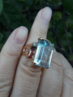 Absolutely Stunning 14k Yellow Gold, Huge Aquamarine, Ruby, Diamond Retro Ring... Aquamarine is approximately 18.15mm x 13.24mm, approximately 15ct. Perfect Vintage Pre Owned Condition.. Size is 7 1/4 Weight is .9 Grams Look Spectacular.. Luxury Emerald Cut Gemstone With 17 Jewels, Luxury Emerald-cut Sapphire Ring With 17 Jewels, Exquisite Yellow Gold Gemstones For Wedding, Luxury White Gold Topaz Ring With Multi-stone, Luxury White Gold Multi-stone Topaz Ring, Luxury Multi-stone White Gold Topaz Ring, Luxury Emerald Cut Gemstones For Anniversary, Gold Emerald Cut Gemstones For Wedding, Yellow Gold Baguette Cut Rings With Accent Stones