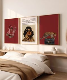 a bedroom with two posters on the wall