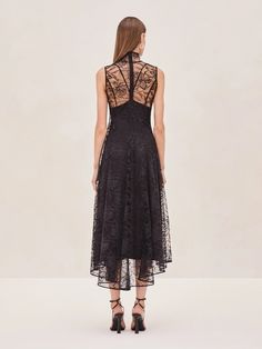 Meet the Rhiane Lace Midi Dress—a blend of elegance and edge that's designed to turn heads. This piece is all about versatility. Wear it with the slip for a more classic, refined look, or without if you're feeling daring. The intricate lace detailing adds a touch of romance, while the sheer fabric keeps things modern and unexpected. Whether you're dressing up for an event or just want to make a statement, Rhiane is your perfect go-to. Elegant Sheer Sleeveless Lace Dress, Elegant Sheer Midi Dress With Fitted Bodice, Elegant Sheer Midi Dress For Gala, Elegant Sheer Midi Dress For Evening, Elegant Sleeveless Evening Dress With Lace Patchwork, Elegant Sleeveless Lace Patchwork Evening Dress, Delicate Lace Sleeveless Gala Dress, Black Sheer Lace Evening Dress, Luxury Lace Trim Dress For Gala