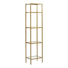 a tall gold metal shelf with glass shelves