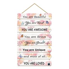 a wooden sign that says you are beautiful