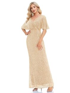 Glowing with elegance, this golden party dress captures the essence of high-end fashion. Its sequin-covered fabric paints a picture of opulence, while the V-neck and body-skimming design enhance a statuesque figure. The flowing skirt adds a note of romance, perfect for special occasions that call for a touch of sparkle and a lot of style. This gown is a must-have for galas or any formal evening event. Size US Bust size (inches) Waist size (inches) Hip size (inches) Length (inches) S 4 34.7 26.8 Golden Party Dress, Golden Party, Dress With Flutter Sleeves, Flowing Skirt, Fabric Paint, High End Fashion, Flutter Sleeves, Flutter Sleeve, Waist Size