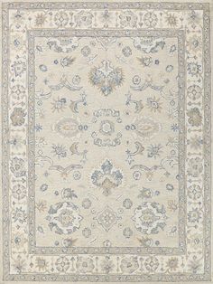 a beige rug with blue and white accents