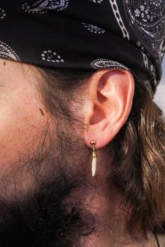 This men's stud earring is made from ethically sourced, real mink bone, this earring embodies raw authenticity and rugged sophistication. Each piece is meticulously handcrafted in small batches, ensuring exclusivity and attention to detail. The natural bone material brings a primal, earthy edge, while the minimalist design offers a modern twist, perfect for the man who appreciates hip, well-made jewelry with a story. A bold accessory for those who defy convention and embrace individuality. Handcrafted with meticulous attention to quality, this stud earring is more than just jewelry--it's a statement of individuality and artistry. Pair it with casual wear or elevate a more refined look; either way, you'll exude confidence and creativity. Key Features: Ethically Sourced Bones  Genuine mink b Taxidermy Jewelry, Goth Earrings, Dangle Earrings Boho, Studs Men, Exude Confidence, Animal Bones, Bold Accessories, Stud Earring, The Minimalist