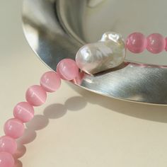 This stunning choker necklace comes in two colors, pink and blue, with pink and blue opal combined with baroque pearls. The unique blend of colors and textures creates a striking contrast, while the irregular shape of the Baroque pearls adds a touch of organic beauty. It's perfect for adding a pop of color and glamor to any look. Metal: 18K Recycled Gold Plated On Brass Gemstone: Baroque Pearls,Cat's Eye Stone Necklace Length: 360-410mm Weight: 47.5g Labor Day Holiday, Pearl Collar, Cats Eye Stone, Tiger Eye Stone, Eye Stone, Blue Cats, Recycled Gold, Organic Beauty, Blue Opal