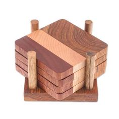 four wooden blocks stacked on top of each other